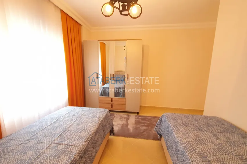 Приобрести Квартира с выходом в сад в Махмутларе трехкомнатная с новой мебелью 19 