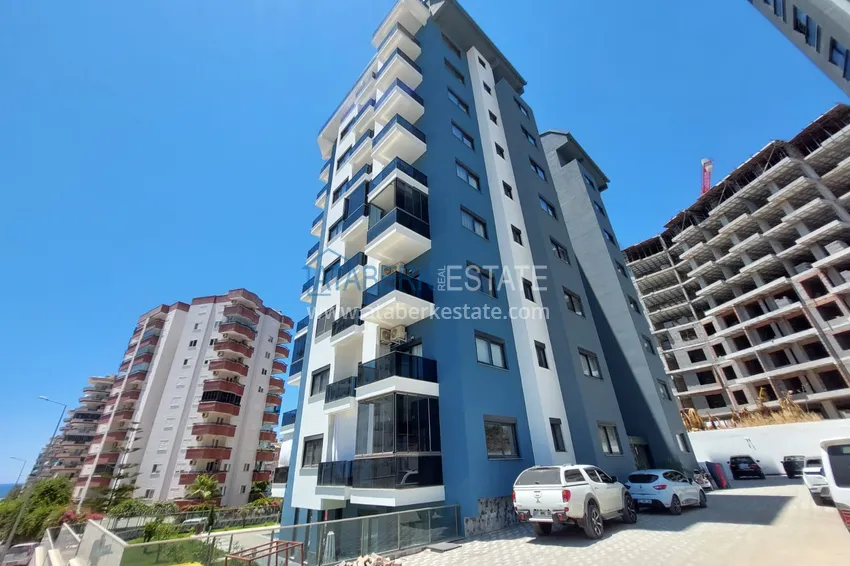 Квартира в Махмутларе в новостройке трехкомнатная с мебелью 2