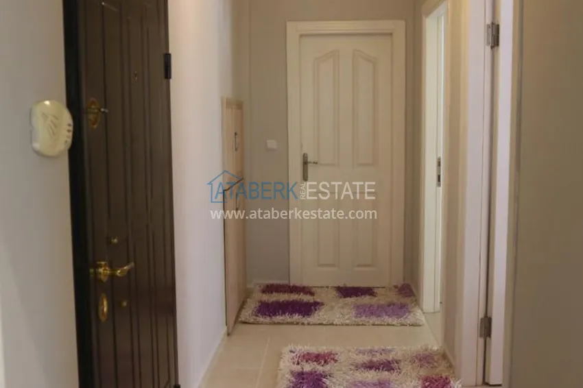 Приобрести Квартира в центре Алании с мебелью в жилом доме городского типа 1 