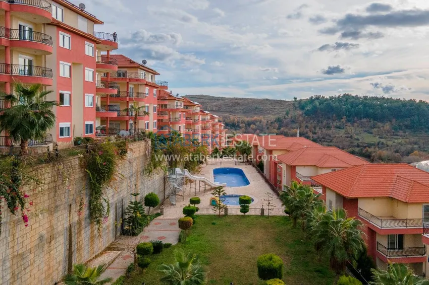 Квартира с выходом в сад в Махмутларе трехкомнатная с новой мебелью 1 