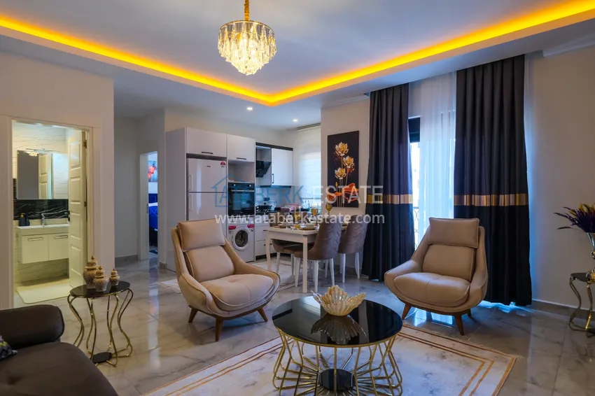 Приобрести Квартира в Махмутларе с новой мебелью, в молодом элитном комплексе 1 