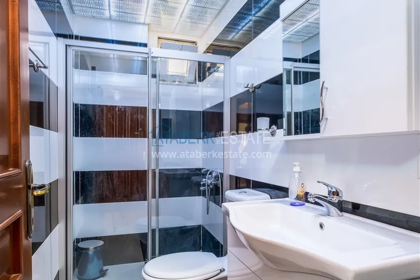 Приобрести Квартира в центре Алании меблированная с отдельной кухней в современной резиденции 22 