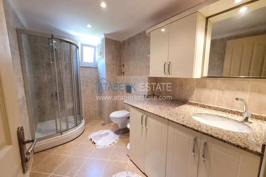 Приобрести Квартира с выходом в сад в Махмутларе трехкомнатная с новой мебелью 20 