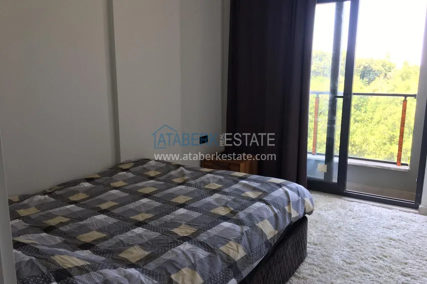 Приобрести Квартира в Алании район Оба двухкомнатная в новостройке 8 