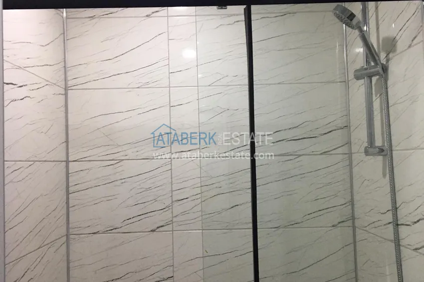 Приобрести Квартира в Алании район Оба двухкомнатная в новостройке 10 