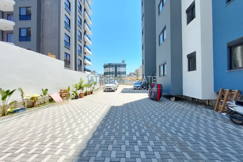 Квартира в Махмутларе в новостройке трехкомнатная с мебелью 5