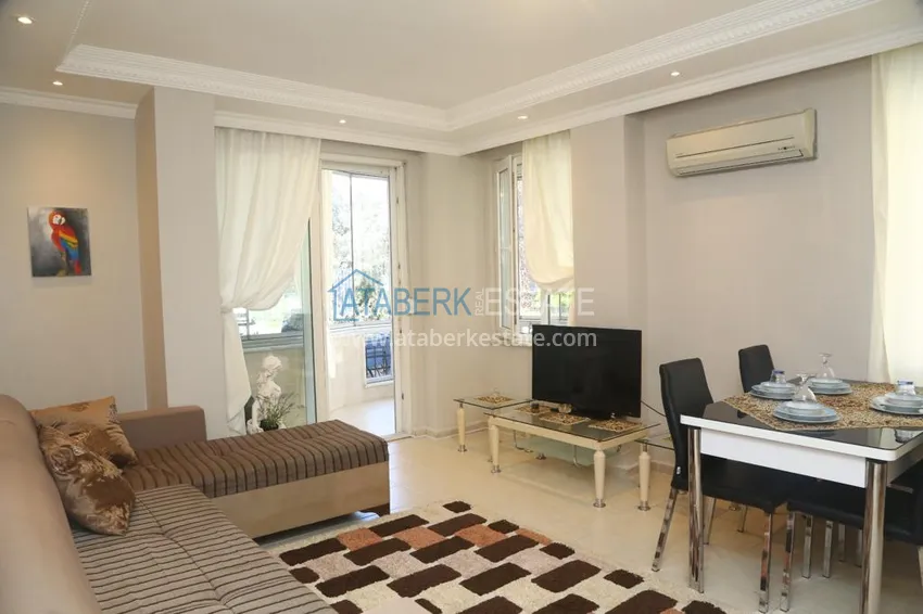 Квартира в центре Алании с мебелью в жилом доме городского типа 1 