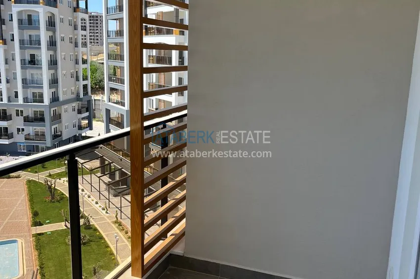 Приобрести Квартира в Алании – район Авсаллар в роскошной резиденции, возле пляжа Инджекум 4 