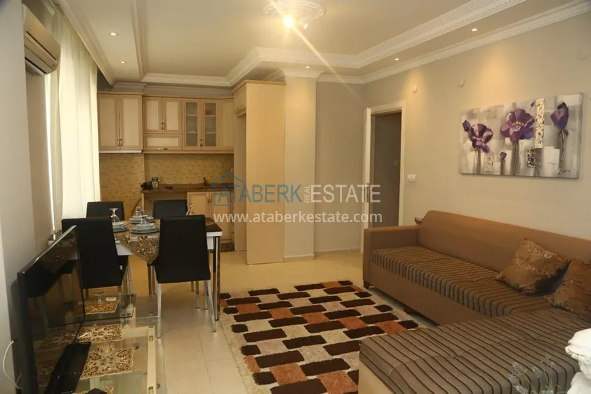 Приобрести Квартира в центре Алании с мебелью в жилом доме городского типа 3 