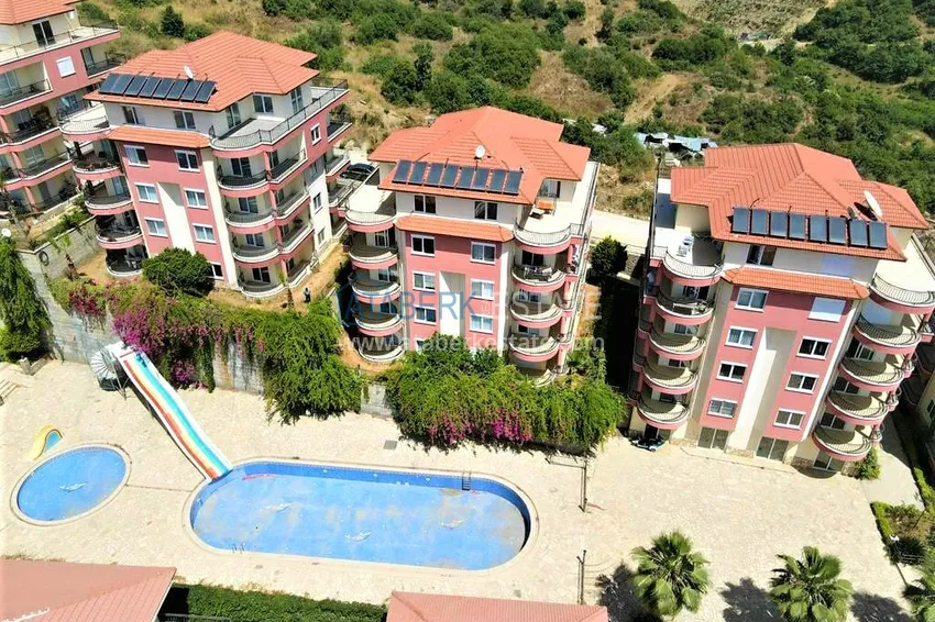 Квартира с выходом в сад в Махмутларе трехкомнатная с новой мебелью 4 