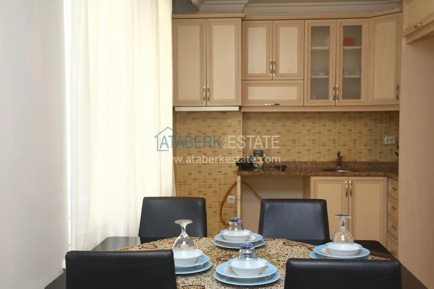 Приобрести Квартира в центре Алании с мебелью в жилом доме городского типа 4 