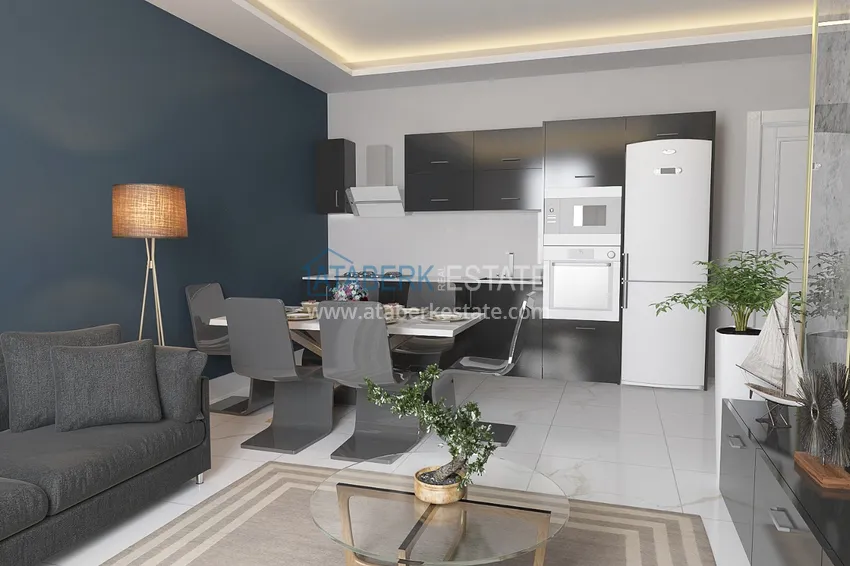 Приобрести Двухкомнатная квартира в Алании – район Оба, строящийся проект 1 