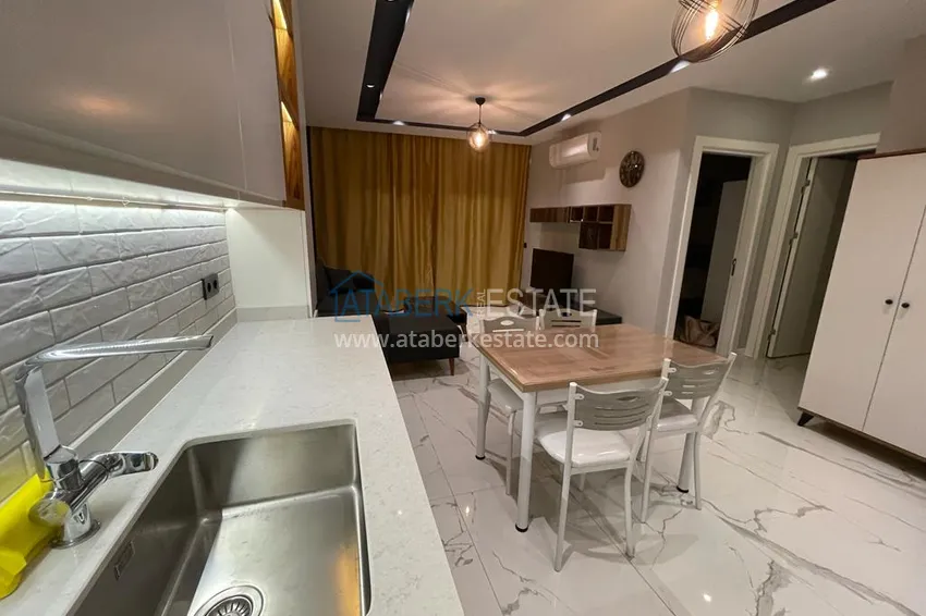 Приобрести В центре Алании на долгосрочную аренду сдаётся двухкомнатная квартира. Максимум 3 человека А1 7