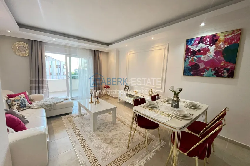 Приобрести Квартира двухкомнатная с мебелью в комплексе рядом с морем в Махмутларе 6