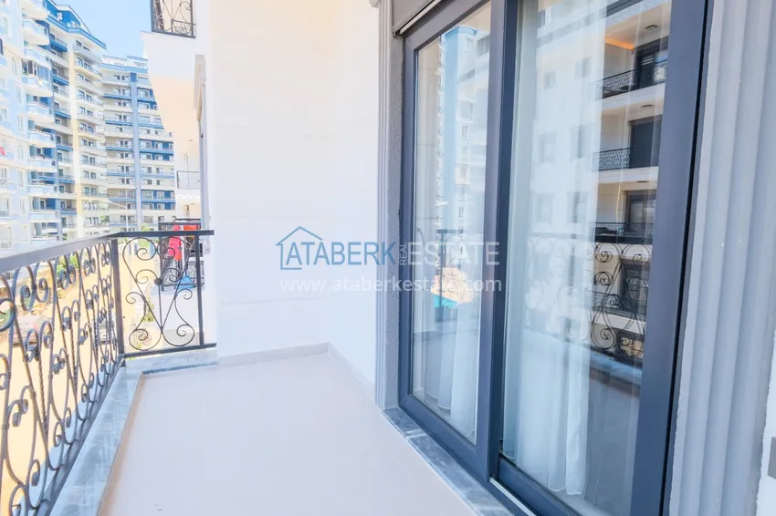 Приобрести Квартира в Махмутларе с новой мебелью, в молодом элитном комплексе 7 