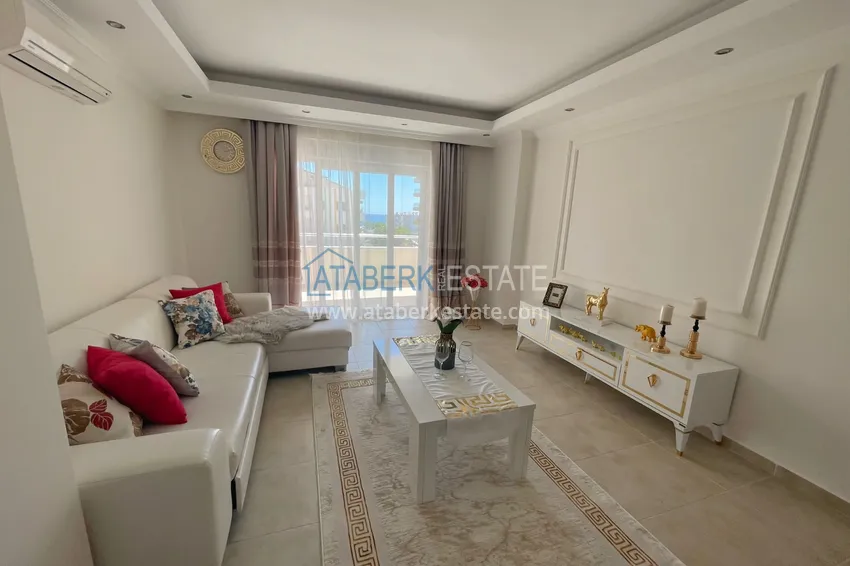 Приобрести Квартира двухкомнатная с мебелью в комплексе рядом с морем в Махмутларе 7