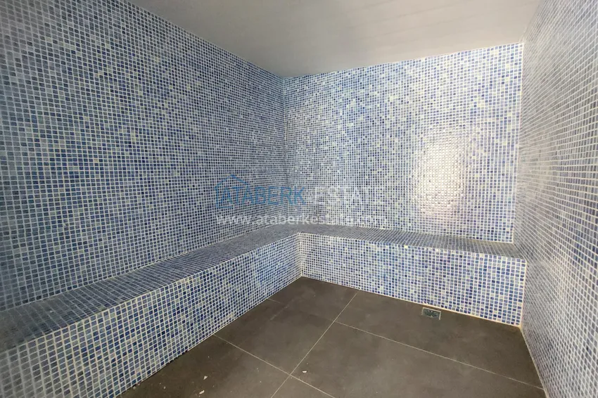 Квартира в Махмутларе в новостройке трехкомнатная с мебелью 9