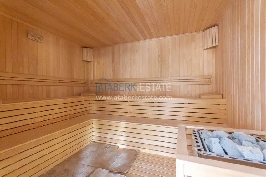 Квартира в Махмутларе в новостройке трехкомнатная с мебелью 10