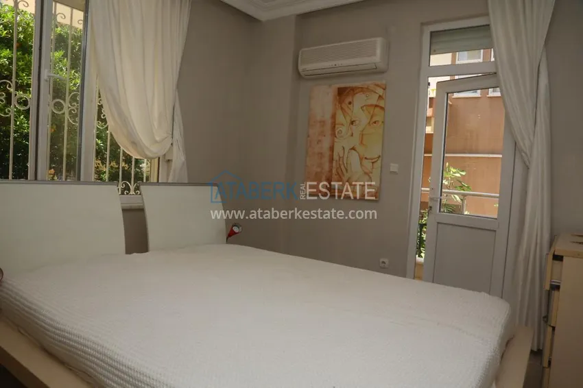 Приобрести Квартира в центре Алании с мебелью в жилом доме городского типа 8 