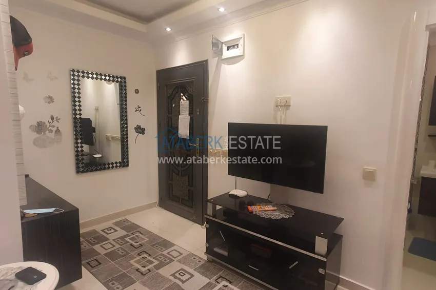 Приобрести Квартира в центре района Оба – Алания с мебелью и застекленным балконом 1 