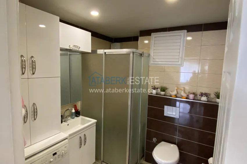 Приобрести Трехкомнатная квартира с современным интерьером в Алании – горный район Тепе 11 