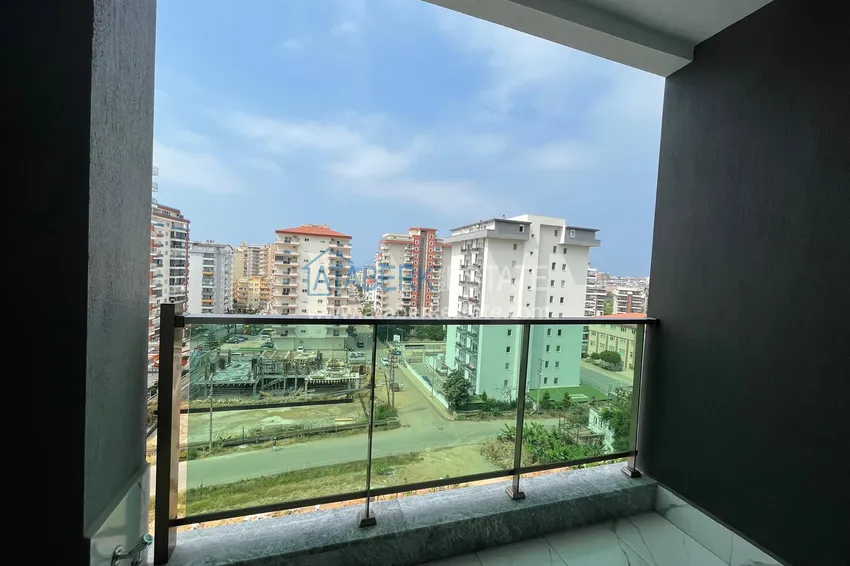 Приобрести Квартира в Махмутларе, с частичным видом на море и мебелью 9 