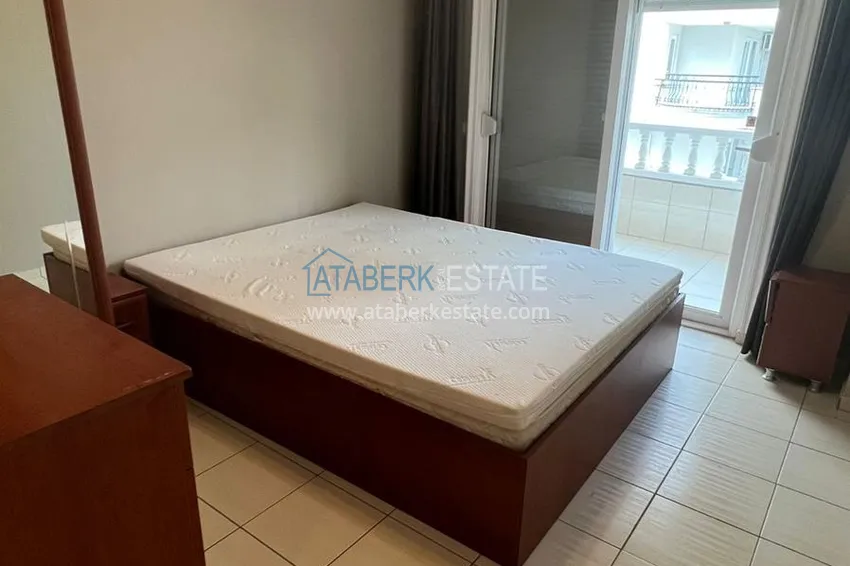 Приобрести Квартира 2+1 в районе Оба с мебелью и застекленным балконом в комфортабельном жилом комплексе 10 