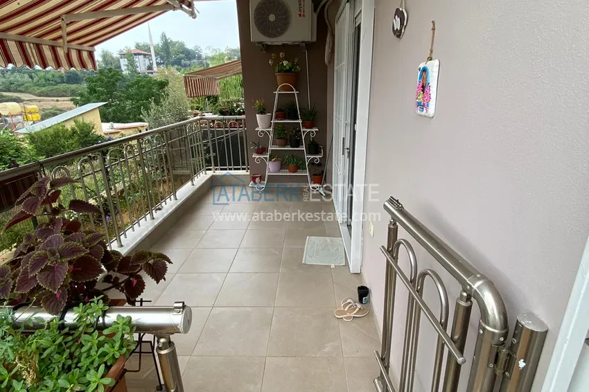 Приобрести Трехкомнатная квартира с современным интерьером в Алании – горный район Тепе 12 