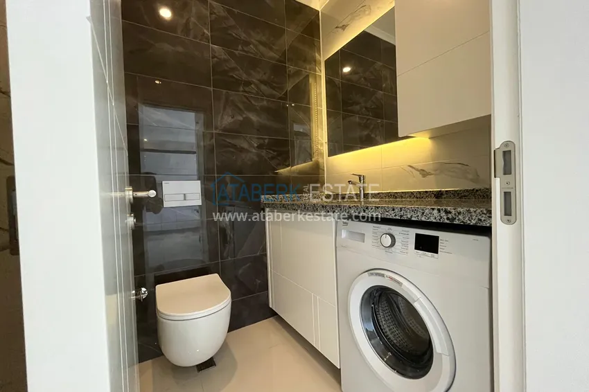 Приобрести Квартира в Махмутларе, с частичным видом на море и мебелью 10 