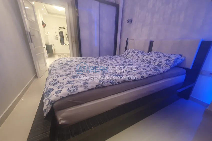 Приобрести Квартира в центре района Оба – Алания с мебелью и застекленным балконом 13 