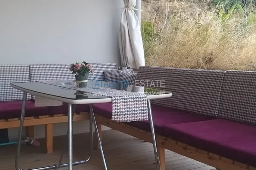 Приобрести Трехкомнатная квартира с современным интерьером в Алании – горный район Тепе 14 