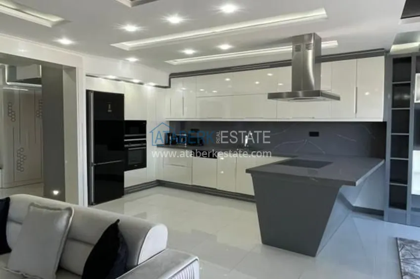 Приобрести Стильная квартира в историческом центре Алании с дизайнерским интерьером и видом на порт 19 