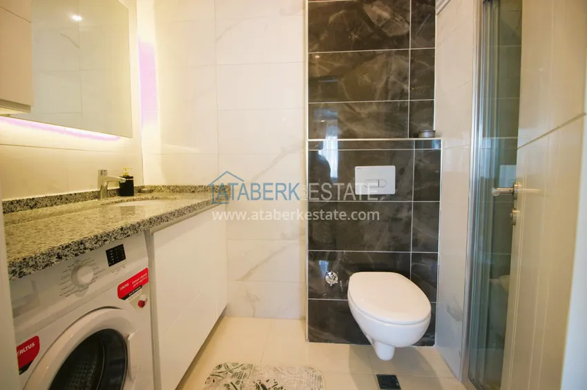 Приобрести Квартира в Махмутларе меблированная в центре района с видом на море 19 