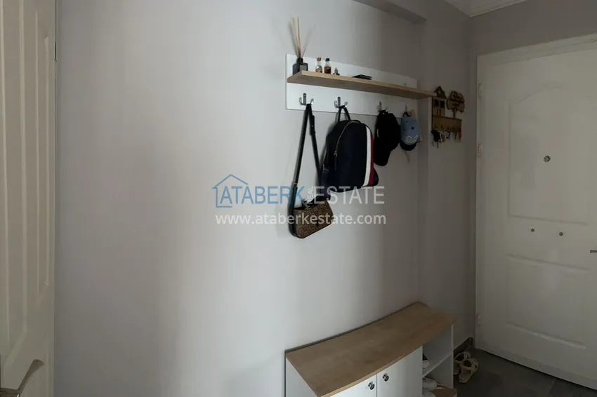 Приобрести Меблированная квартира с выходом в сад и видом на горы в Алании, район Оба в уютном жилом комплексе 1 