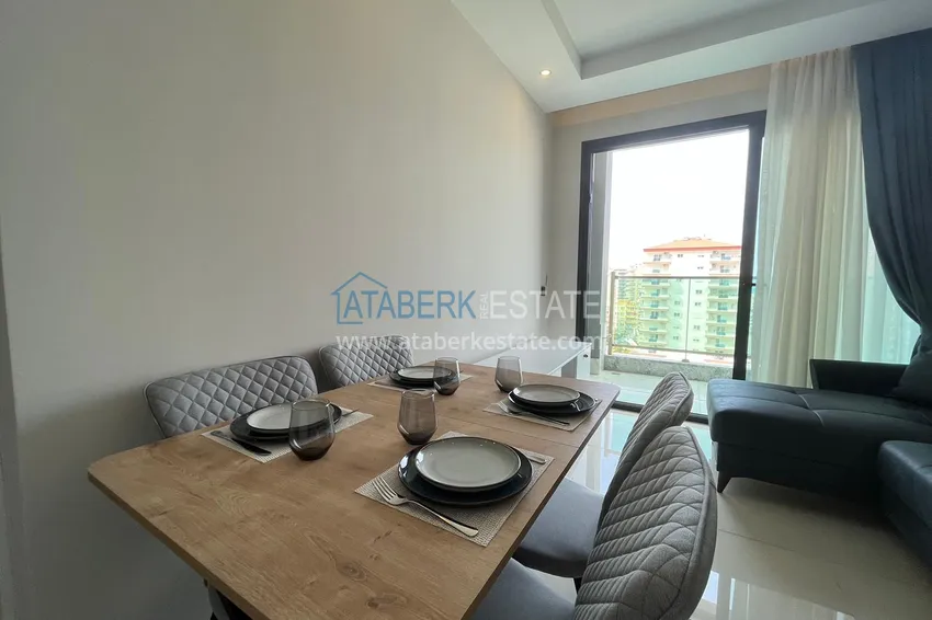 Приобрести Квартира в Махмутларе, с частичным видом на море и мебелью 1 