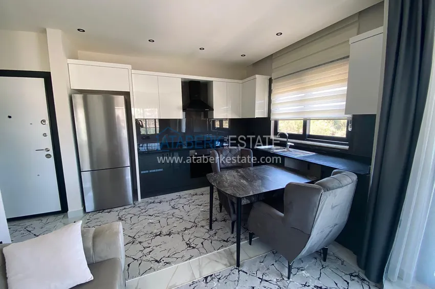 Приобрести Квартира в районе Оба с новой мебелью и видом на море, напрямую от собственника 1 