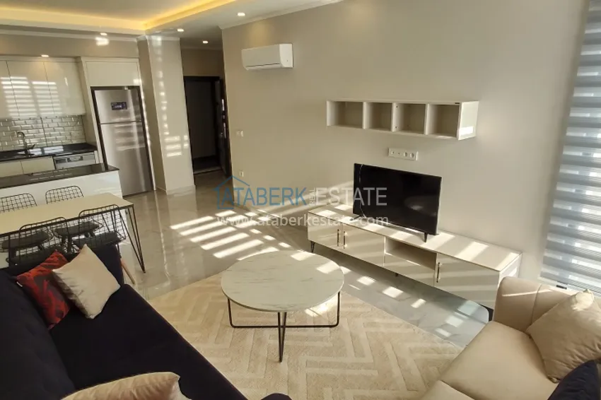 Приобрести Двухкомнатная квартира с новой мебелью в Алании район Авсаллар - Новостройка 1 