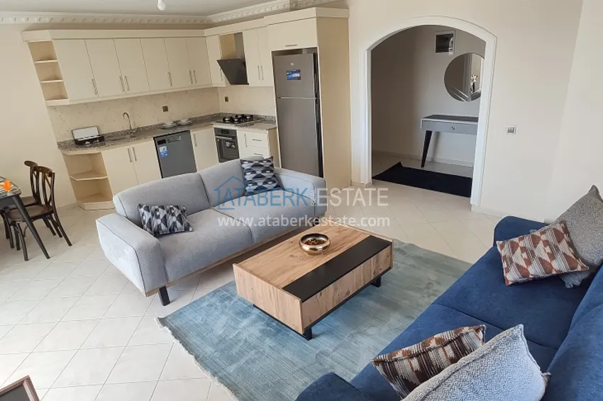 Видовые апартаменты с 2 спальнями в районе Махмутлар в благоустроенном комплексе 1 