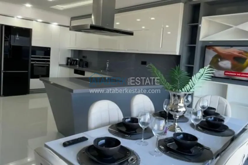 Приобрести Стильная квартира в историческом центре Алании с дизайнерским интерьером и видом на порт 25 