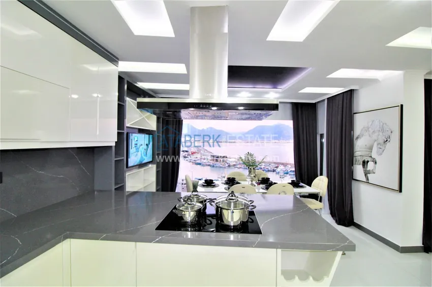 Приобрести Стильная квартира в историческом центре Алании с дизайнерским интерьером и видом на порт 27 