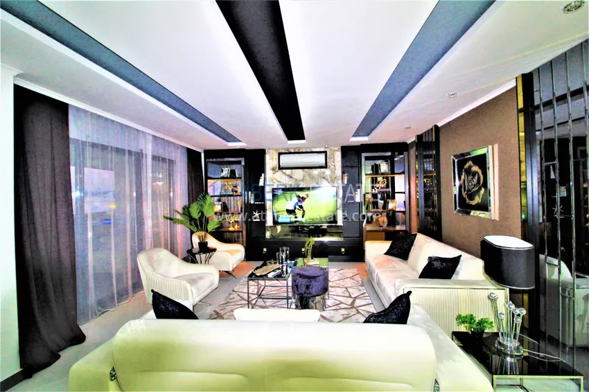 Приобрести Стильная квартира в историческом центре Алании с дизайнерским интерьером и видом на порт 29 