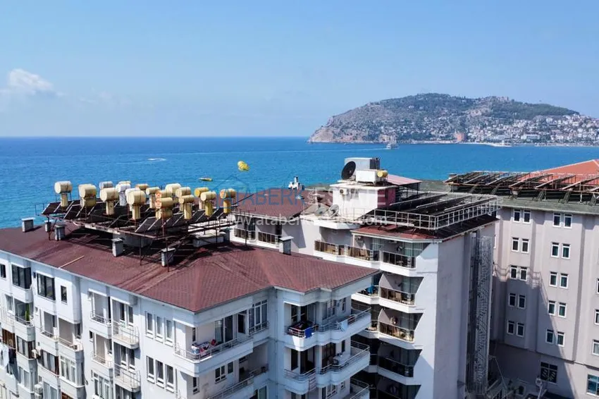 Линейная квартира с 3 спальнями и боковым видом на море в районе Оба 1 
