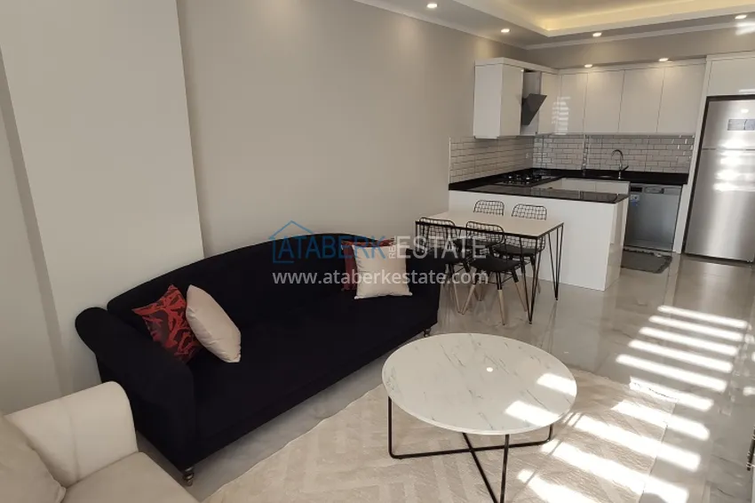 Приобрести Двухкомнатная квартира с новой мебелью в Алании район Авсаллар - Новостройка 2 