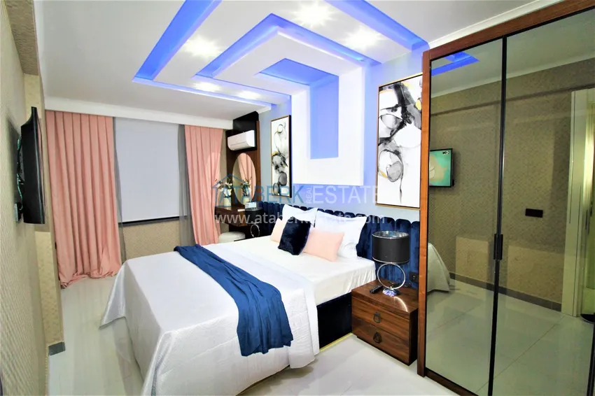 Приобрести Стильная квартира в историческом центре Алании с дизайнерским интерьером и видом на порт 36 