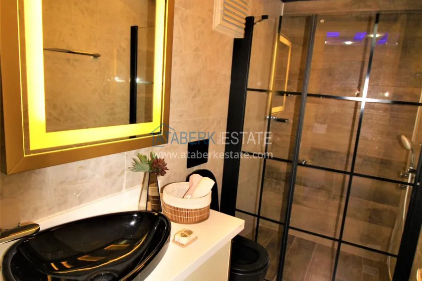 Приобрести Стильная квартира в историческом центре Алании с дизайнерским интерьером и видом на порт 38 