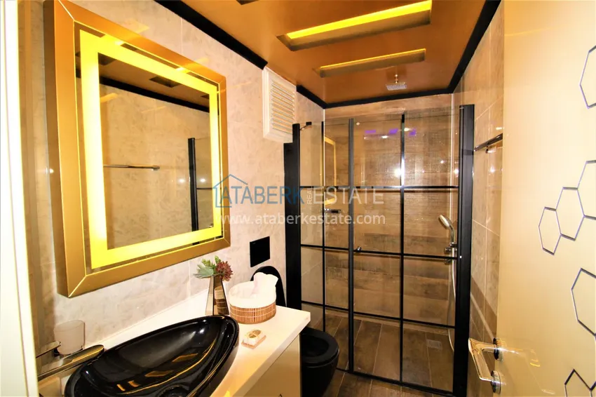 Приобрести Стильная квартира в историческом центре Алании с дизайнерским интерьером и видом на порт 39 