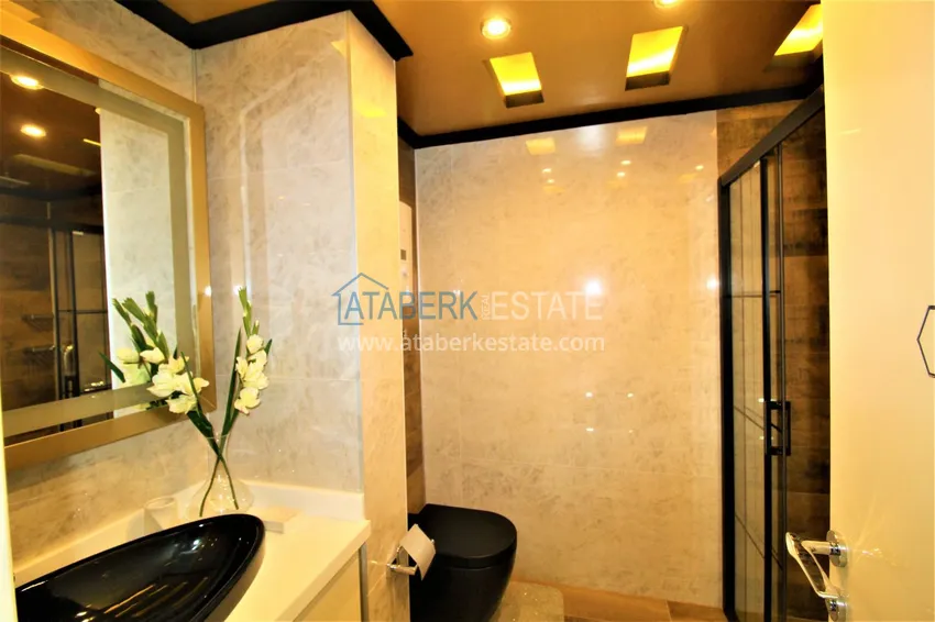 Приобрести Стильная квартира в историческом центре Алании с дизайнерским интерьером и видом на порт 40 