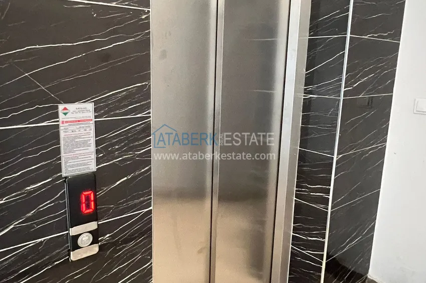 Двухкомнатная квартира в Алании - район Оба в жилом доме городского типа 3 