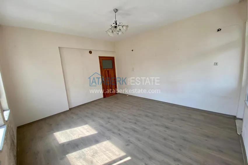 Приобрести Линейная квартира с 3 спальнями и боковым видом на море в районе Оба 3 