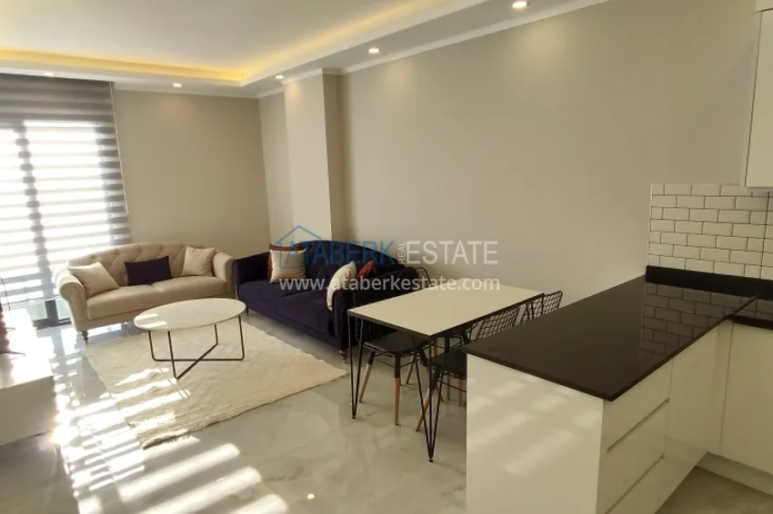 Приобрести Двухкомнатная квартира с новой мебелью в Алании район Авсаллар - Новостройка 3 